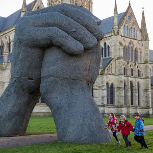 texters vulnerable to sophie ryder's giant hand sculpture bump their heads