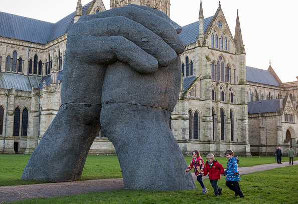 texters vulnerable to sophie ryder's giant hand sculpture bump their heads