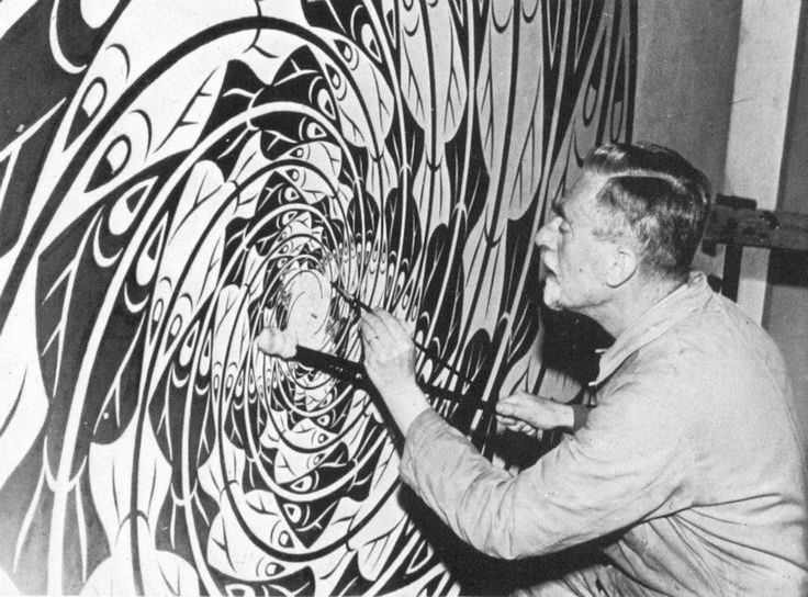 Escher at work in his studio making a tessalation