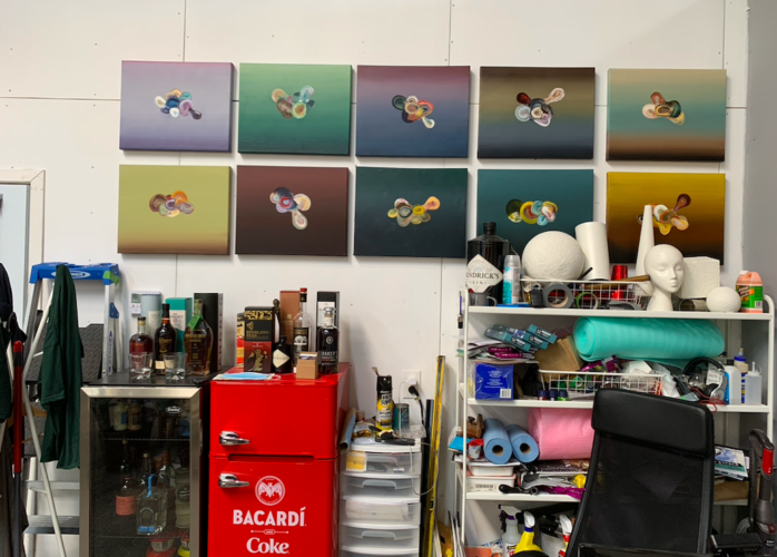 View of Jay Chung's studio with small abstract "Cosmos" studies hanging on the rear wall