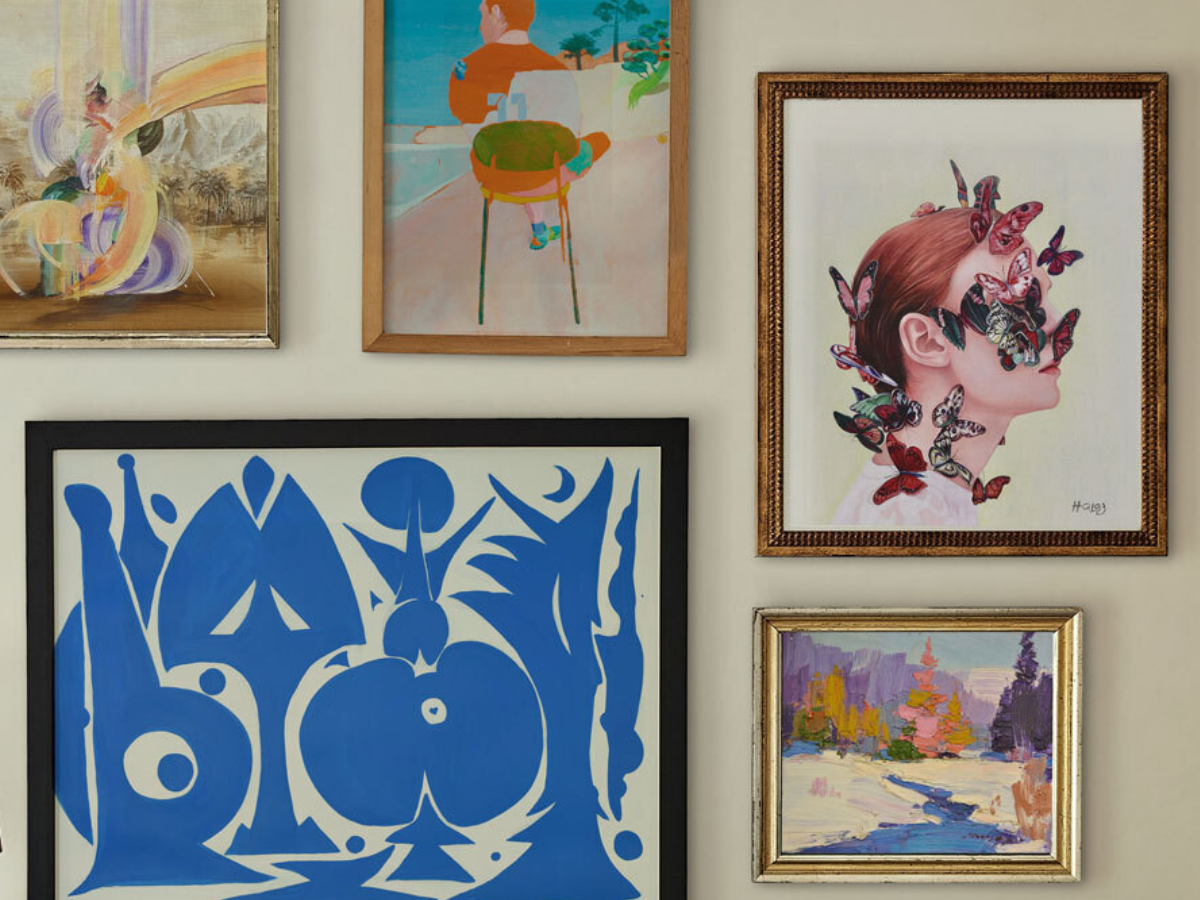 Example of gallery wall showcasing how to collect and showcase paintings in frame.