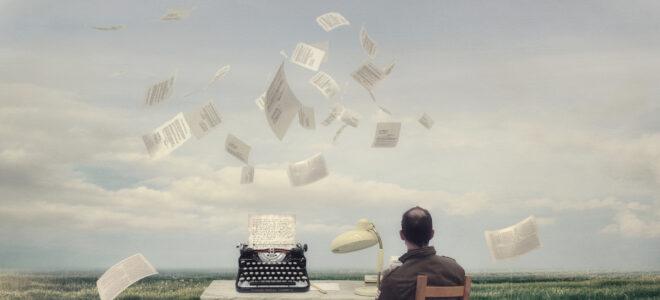 Man sits at typewriter in surrealist photograph. Possibly working on an artwork description?